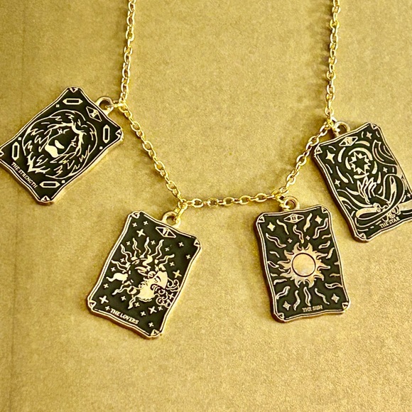 Jewelry - NWOT Necklace tarot card charms: strength, sun, lovers, star black enamel 21”